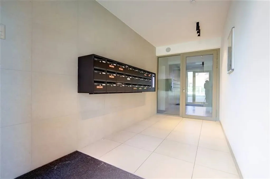Esik - Energy-Efficient Apartment with River View in Boom