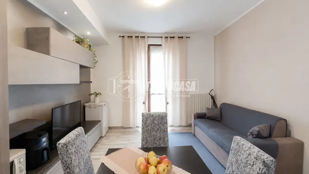 Séjour - Modernised Three-Bedroom Apartment in Muggiò