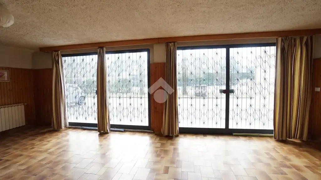 Séjour - Spacious Apartment with Private Courtyard in Castelnuovo Rangone