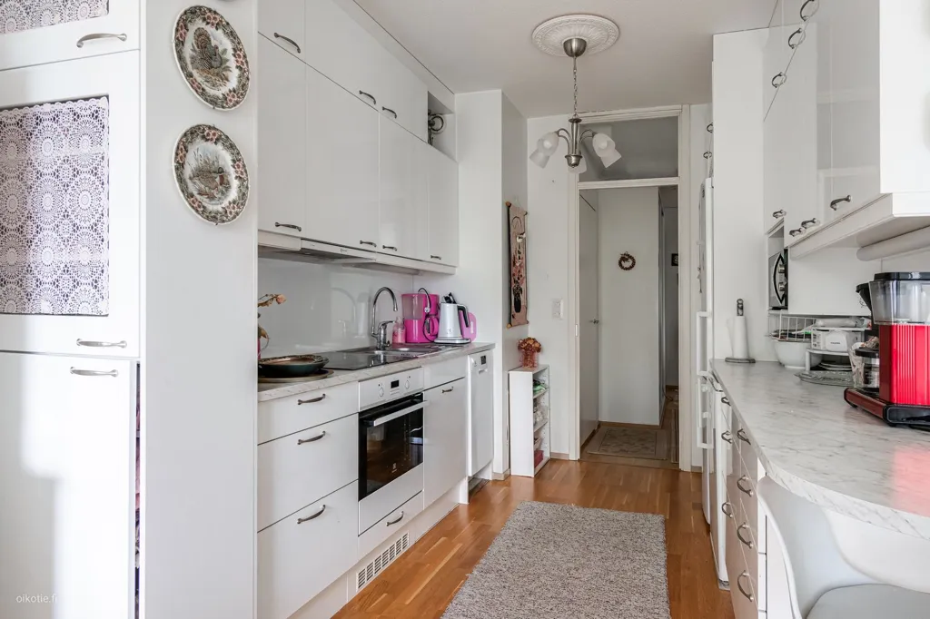 Kitchen - City Centre Apartment with Balcony in Helsinki