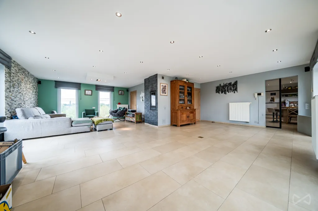 Living Room - House with Photovoltaic Panels in Courcelles