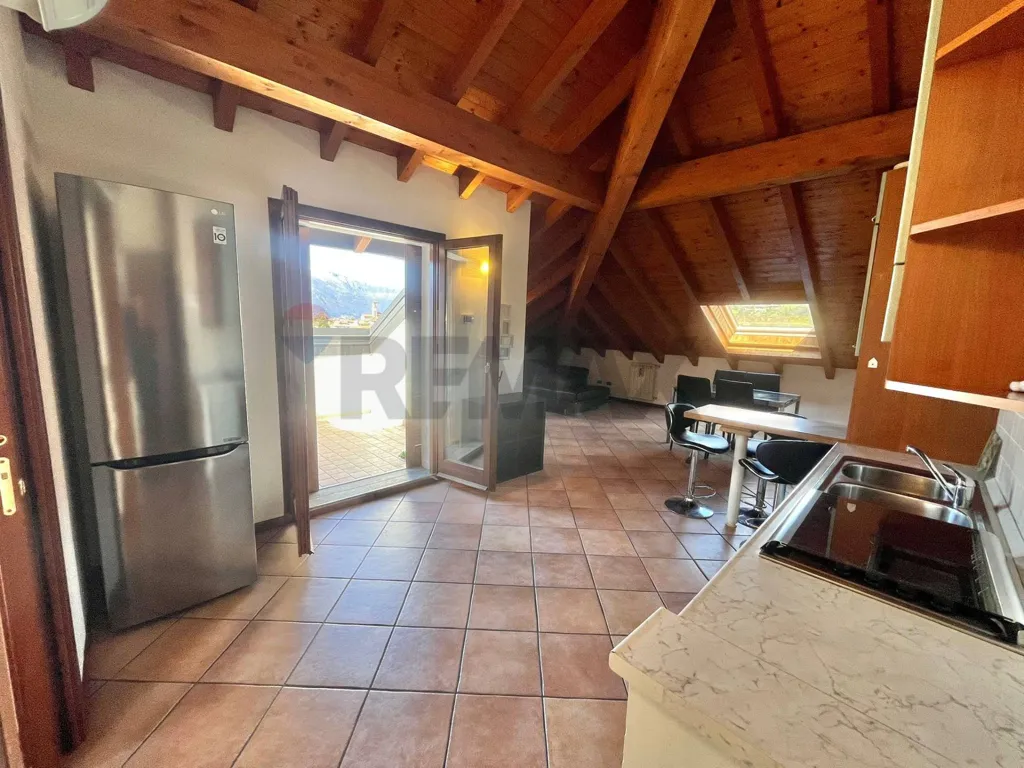 Toad - Panoramic Attico with Terrace in Luino