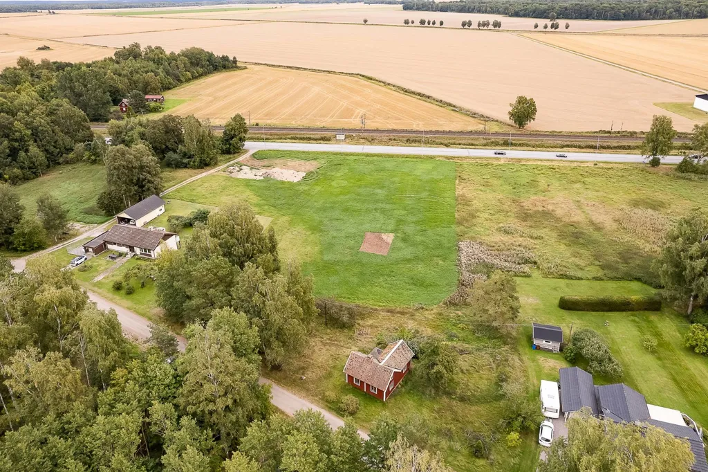 Aerial - Renovation-Ready Plot with Lake Access near Örebro