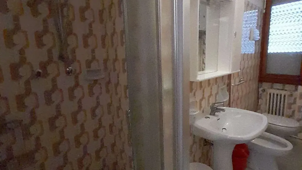 Salles de bain - Spacious 3-Bedroom Apartment in Jesolo