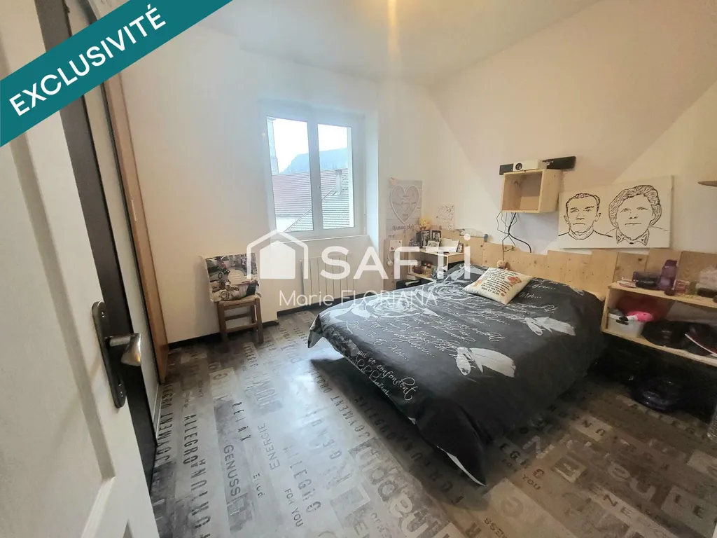 Chambres - Appartement Lumineux avec 4 Chambres à Dortan