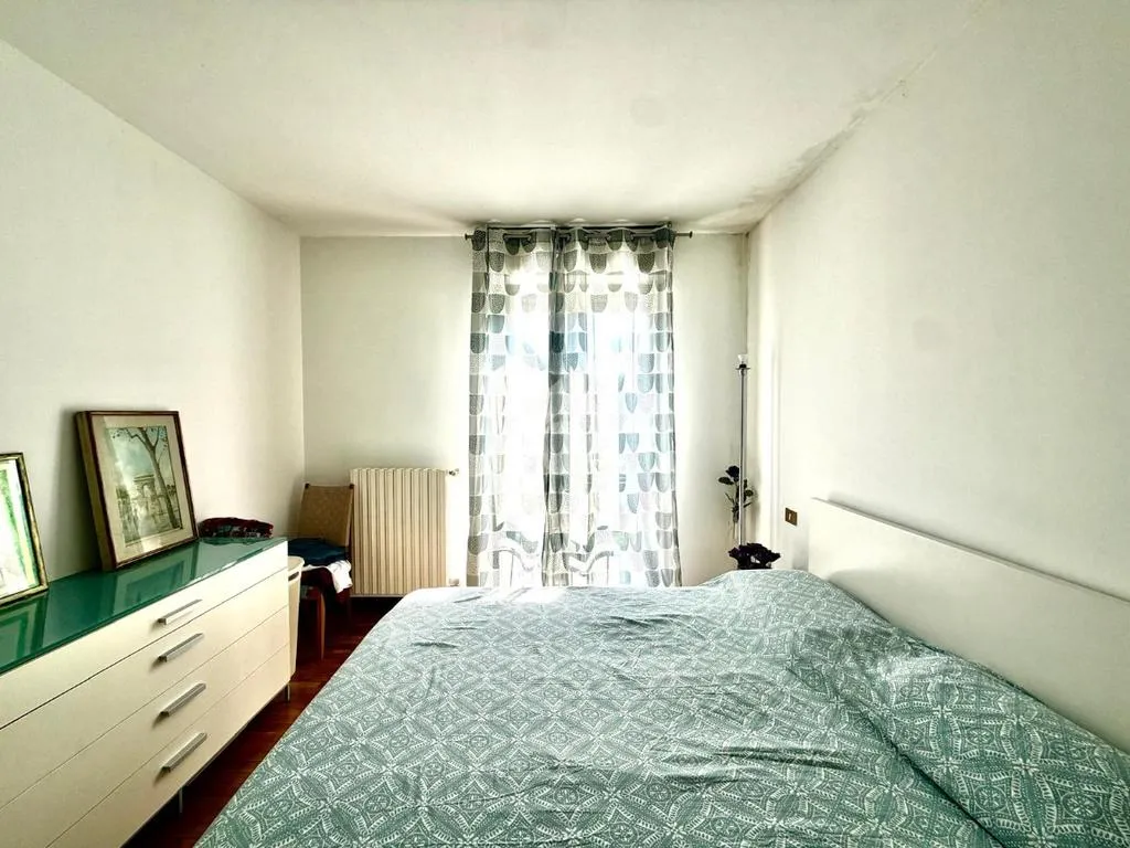 Camere da letto - Three-bedroom Apartment with Balcony in Brescia