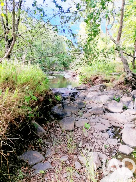 Giardino - Loisirs Terrain with River View in Queaux