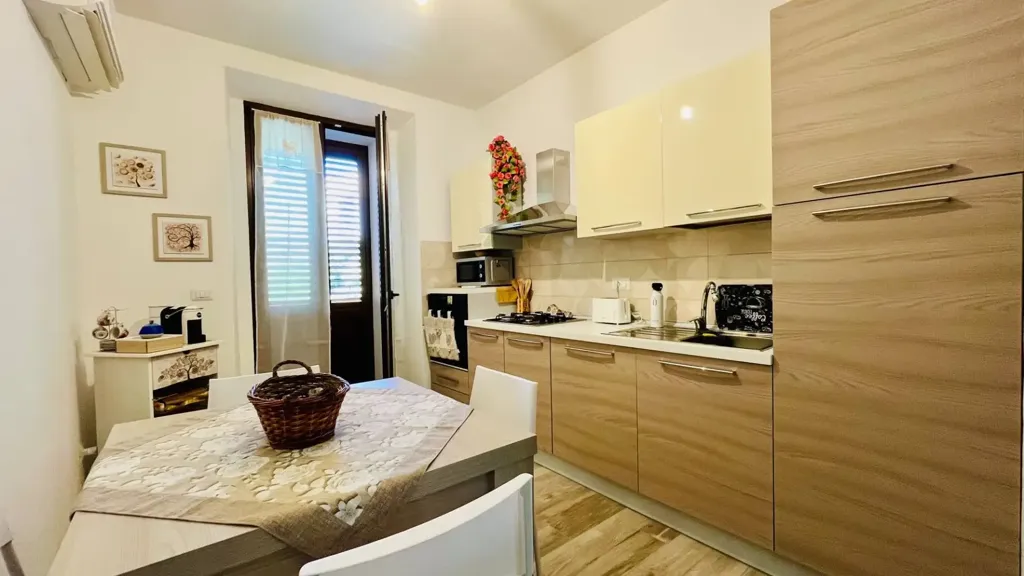 Köök - Fully Renovated Apartment with Balconies in Alghero