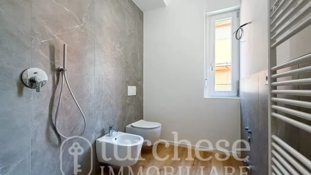 Bathrooms - Modernised Two-Bedroom Apartment in Bergamo