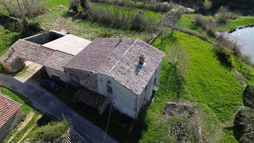 Aerial - Renovable Building with Courtyard in Champis