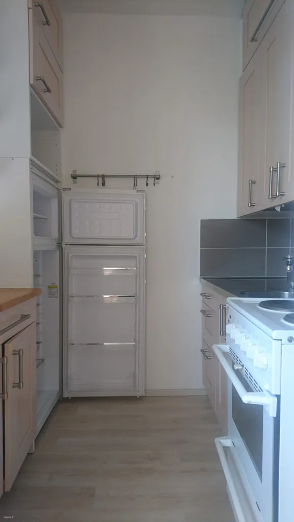 Kitchen - Modernised Apartment with Balcony in Hakunila