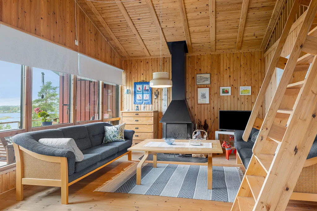 Salón - Cottage with Fireplace in Råneå