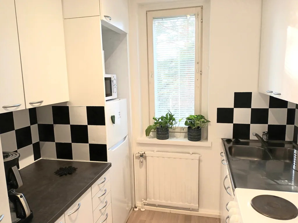 Cucina - Modernised Apartment with Park Views in Varkaus