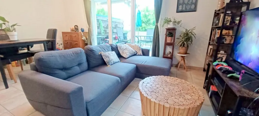 Living Room - Three-Bedroom Apartment with Terrace in Collonges