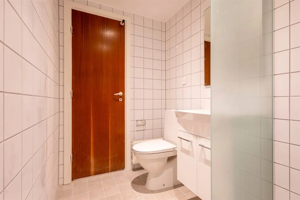 Bathrooms - Two-Bedroom Flat in Bøgeparken, Odense NØ