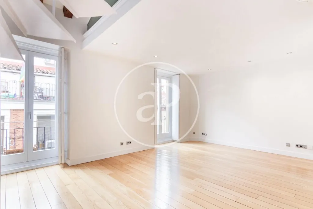 Living Room - Modern Apartment with Balcony Views in Madrid Centre