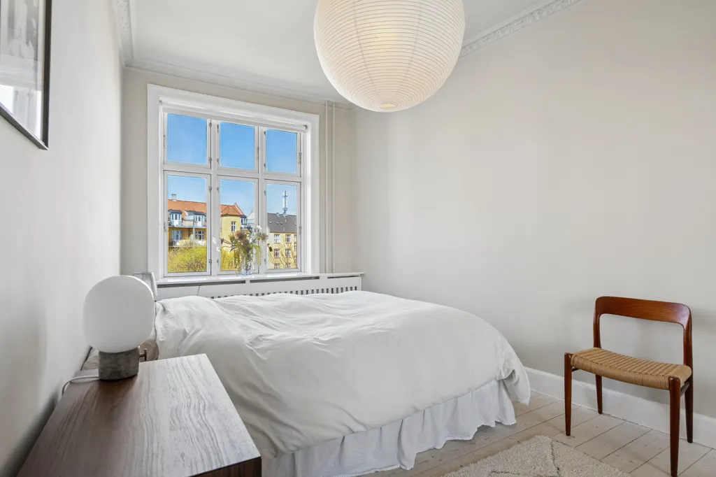 Bedrooms - Charming Flat with City View in Valby