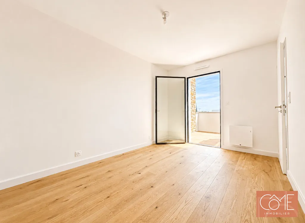 Pièces - Appartement avec Balcon au Centre de Saint-Grégoire