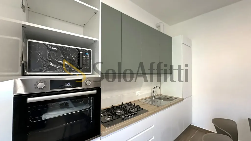 Kitchen - Ristrutturato Appartamento with Balcony in Forli'