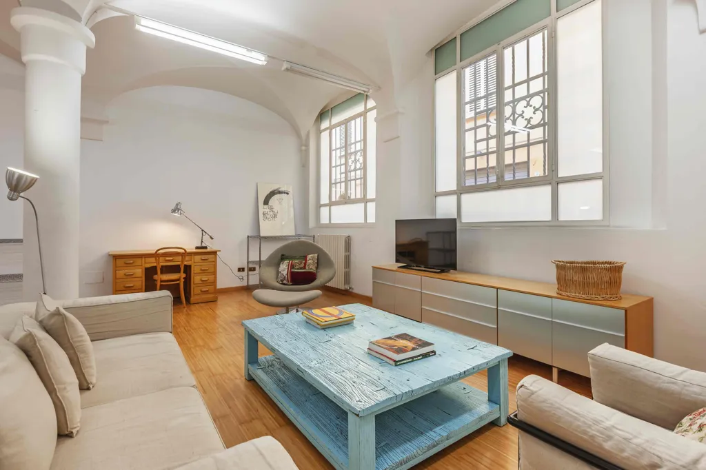 Séjour - Open-Plan Loft with Short-Term Rental in Bologna