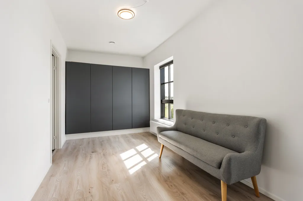 Esik - Modern Rowhouse with South-Facing Garden in Paderup