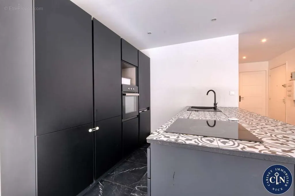 Köök - Renovated Apartment with Garden in Fabron