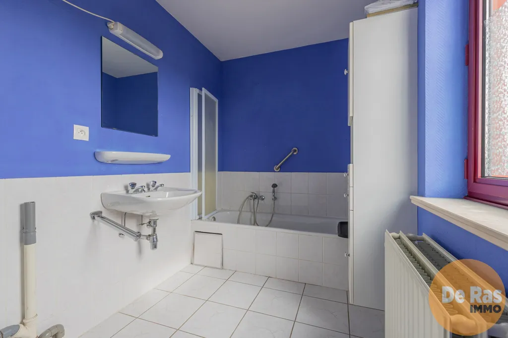Salles de bain - Appartement avec Vue sur la Place du Marché à Herzele