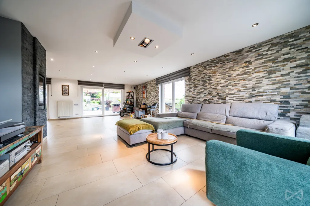 Living Room - House with Photovoltaic Panels in Courcelles