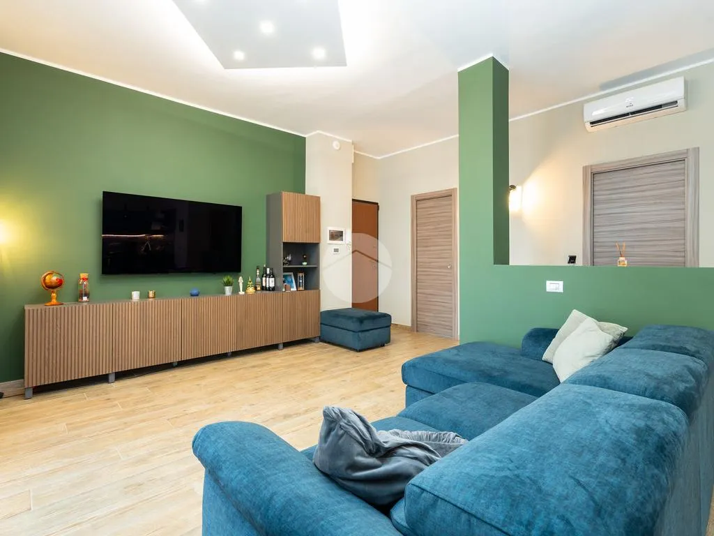 Living Room - Modernised 3-Bedroom Apartment in Druento