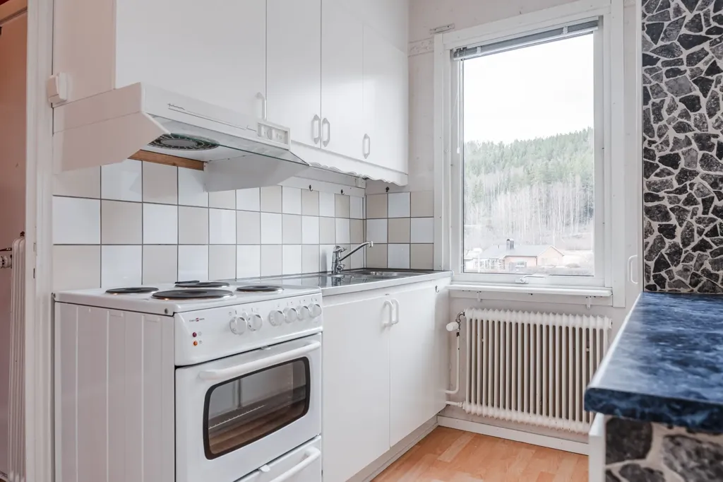 Köök - Apartment with South-Facing Balcony in Sollefteå