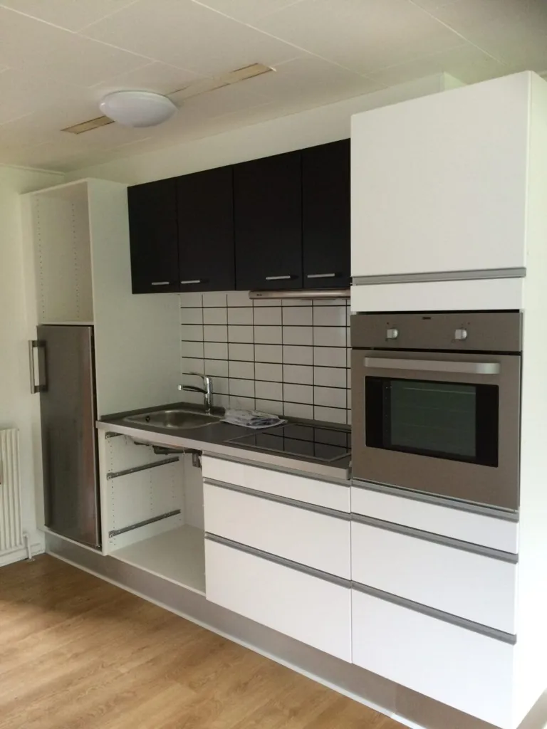 Köök - Charming 2-Bedroom Flat with Balcony in Kjellerup