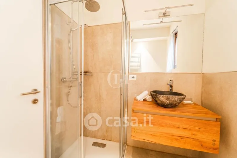 Bathrooms - Centrally Located Flat with Sea View in Torbole