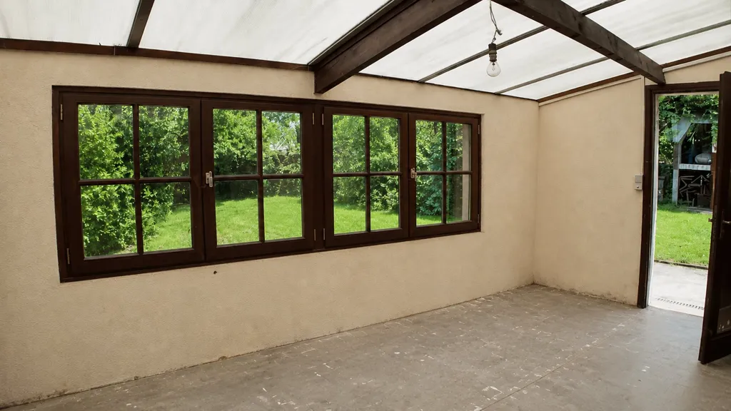 Terrasse - Maison avec 3 Garages à Louzes
