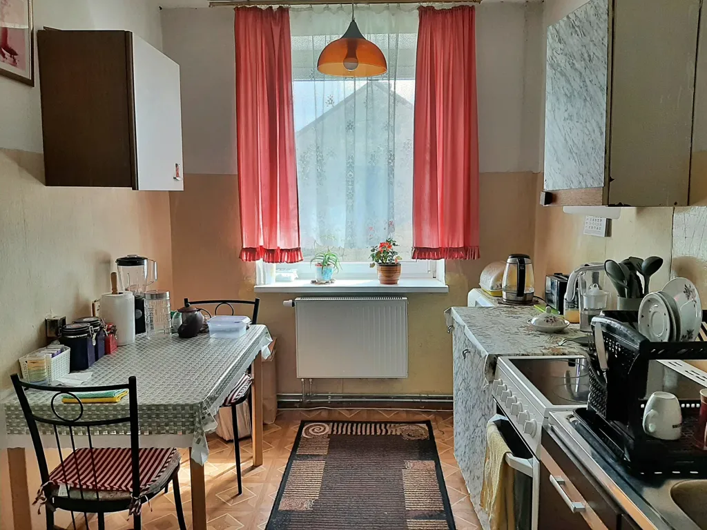 Cuisine - Two-Bedroom Apartment with Balcony in Biržai