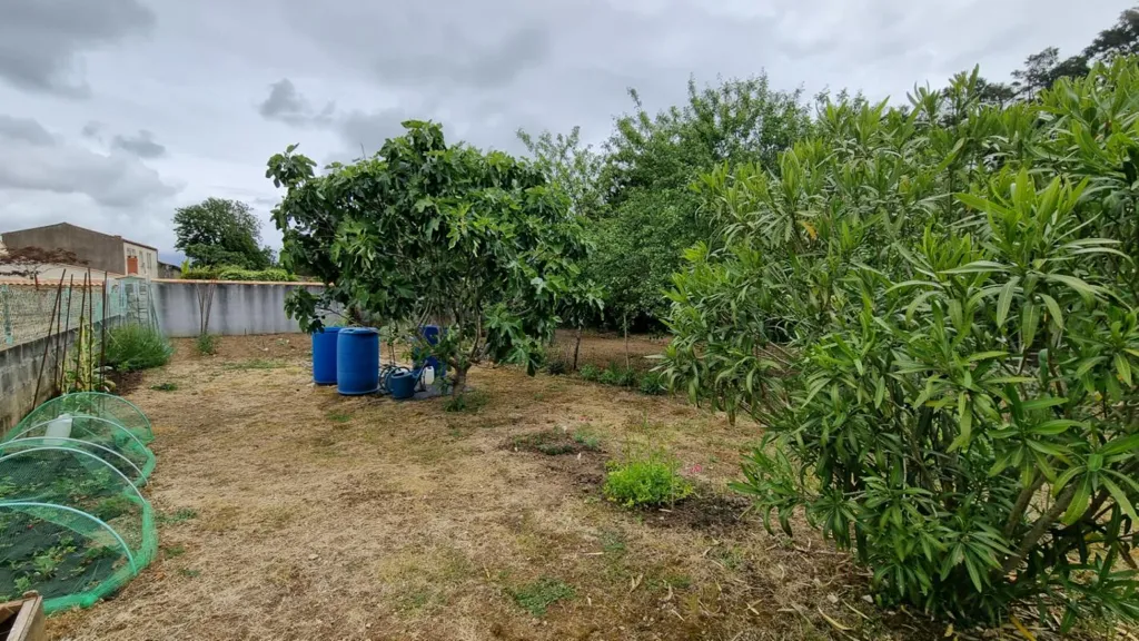 Jardin - Maison avec Jardin et Garage à Les Magnils Reigniers