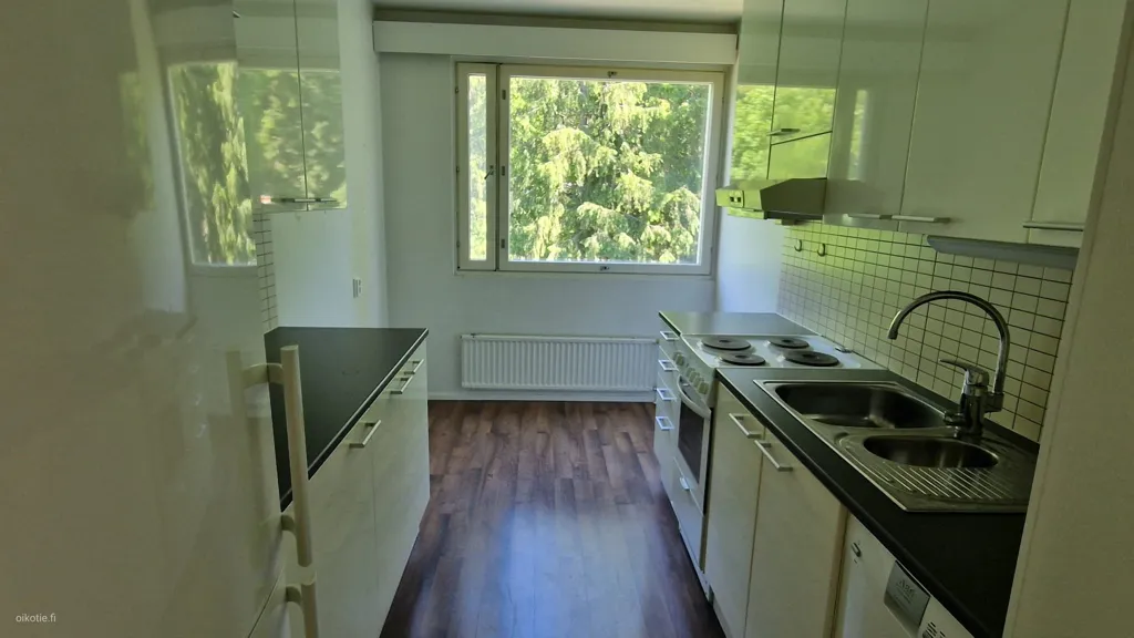 Kitchen - Bright Apartment with Balcony in Lahti