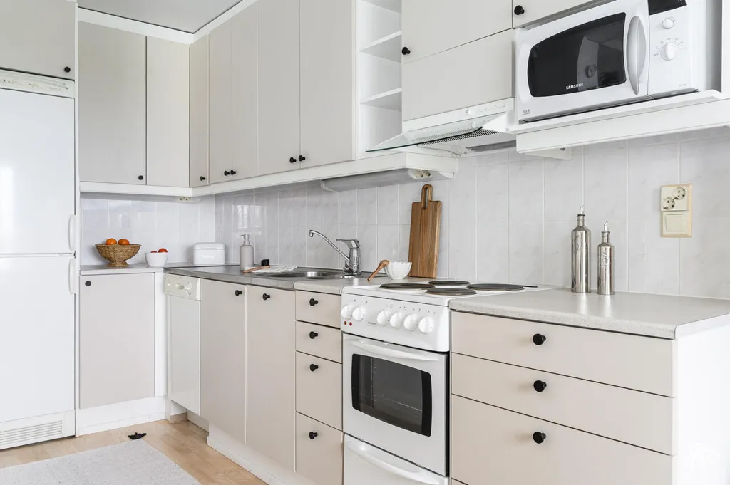 Köök - City Apartment with Sauna in Oulu Centre