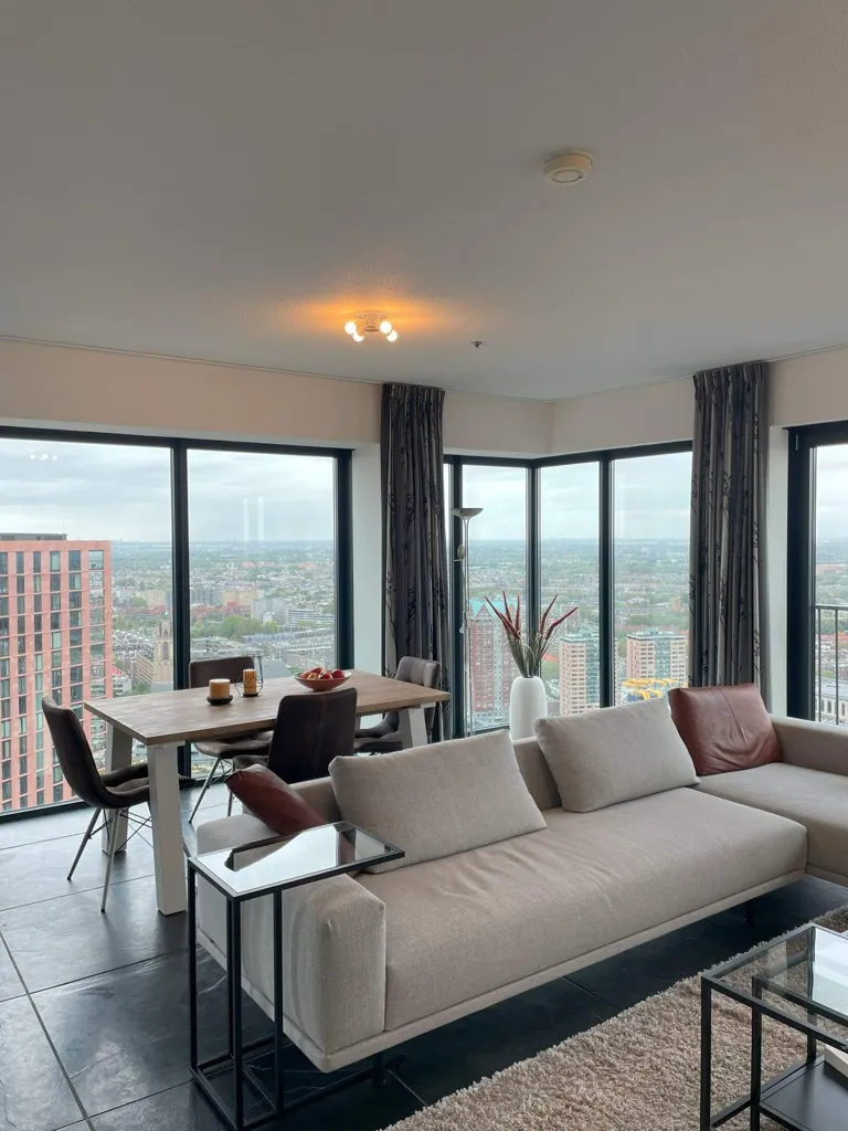 Living Room - Furnished Apartment with City View in Rotterdam