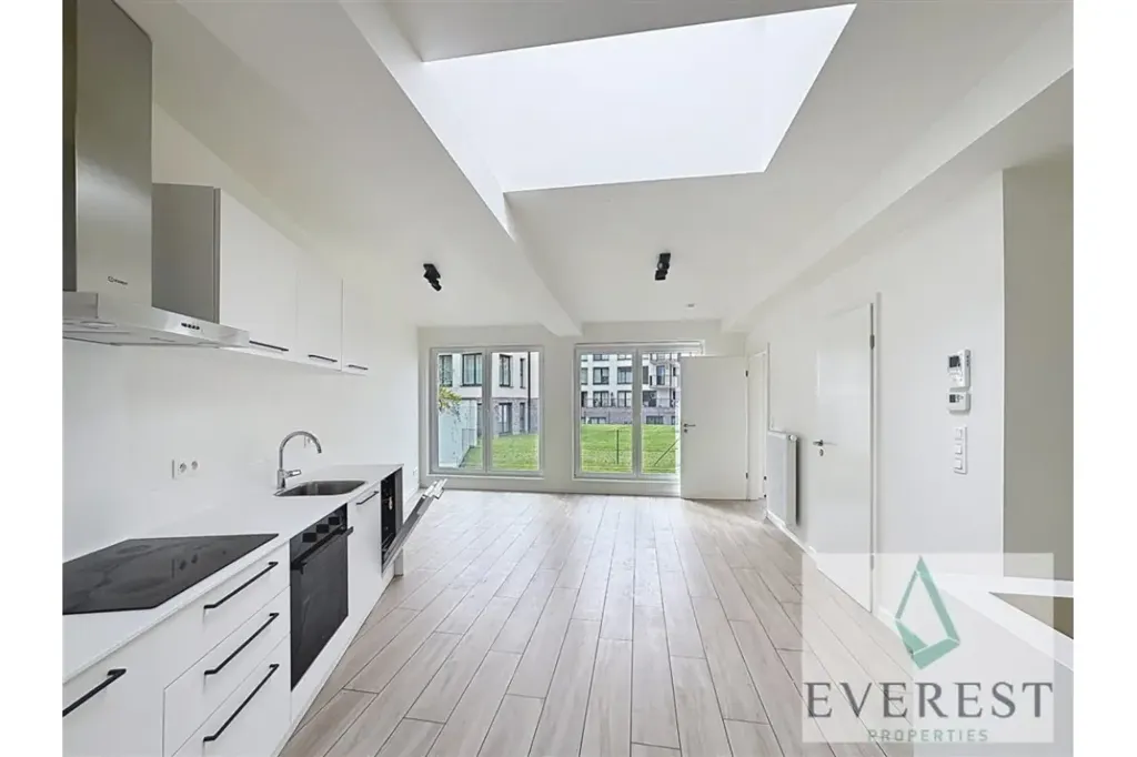 Cuisine - Appartement Duplex avec Jardin et Terrasse à Laeken