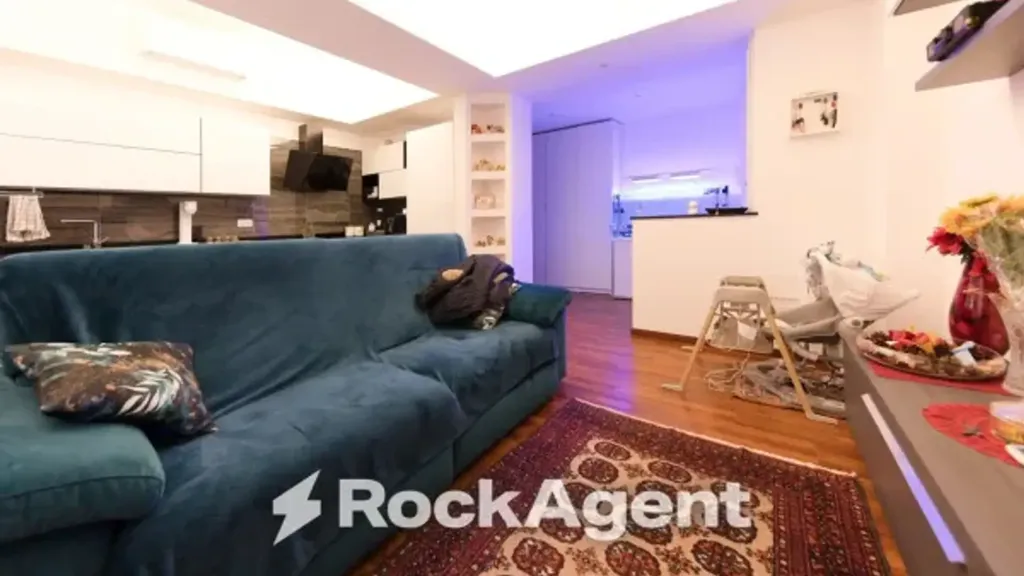 Living Room - Penthouse Apartment with Balcony in Genoa