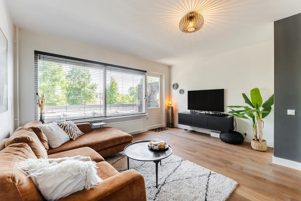 Séjour - Maisonnette with Garden View in Linschoten