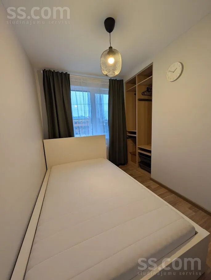 Schlafzimmer - 3-Bedroom Flat with Balcony in Āgenskalns