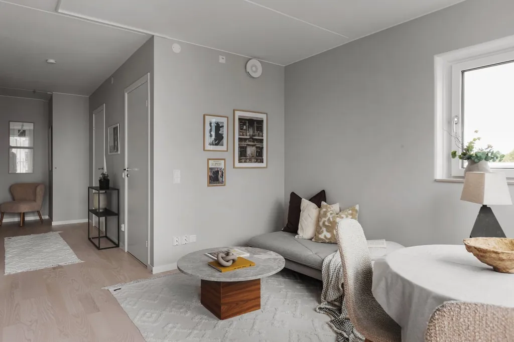 Séjour - Apartment with Balcony and Garden View in Malmö