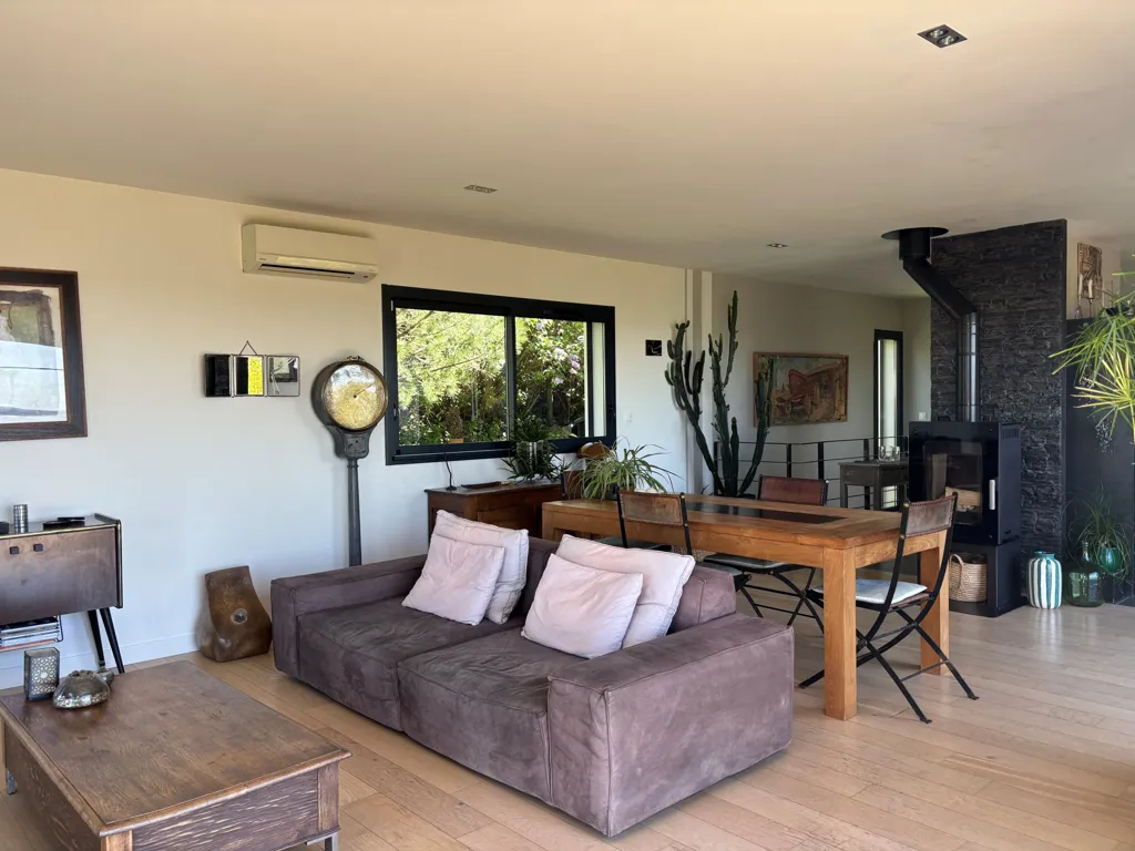 Living Room - Contemporary House with Panoramic View in Green Setting