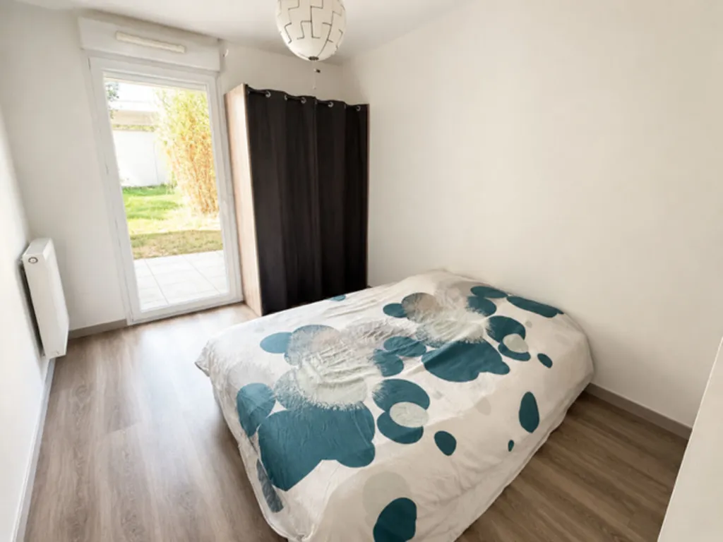 Chambres - Appartement T3 avec Jardin et Garage à Proximité des Commodités
