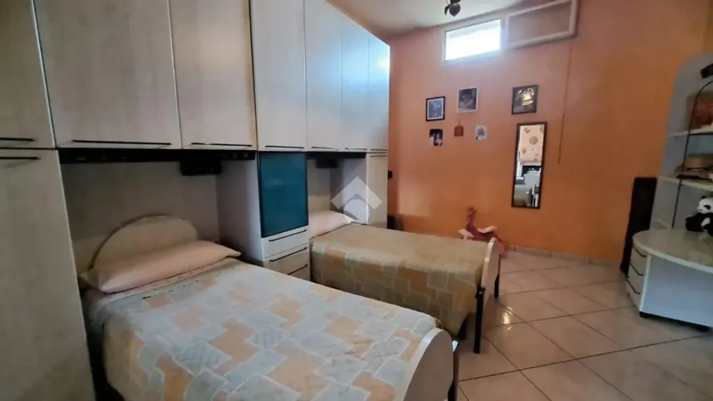 Bedrooms - Three-Bedroom Apartment with Fireplace in San Marcellino