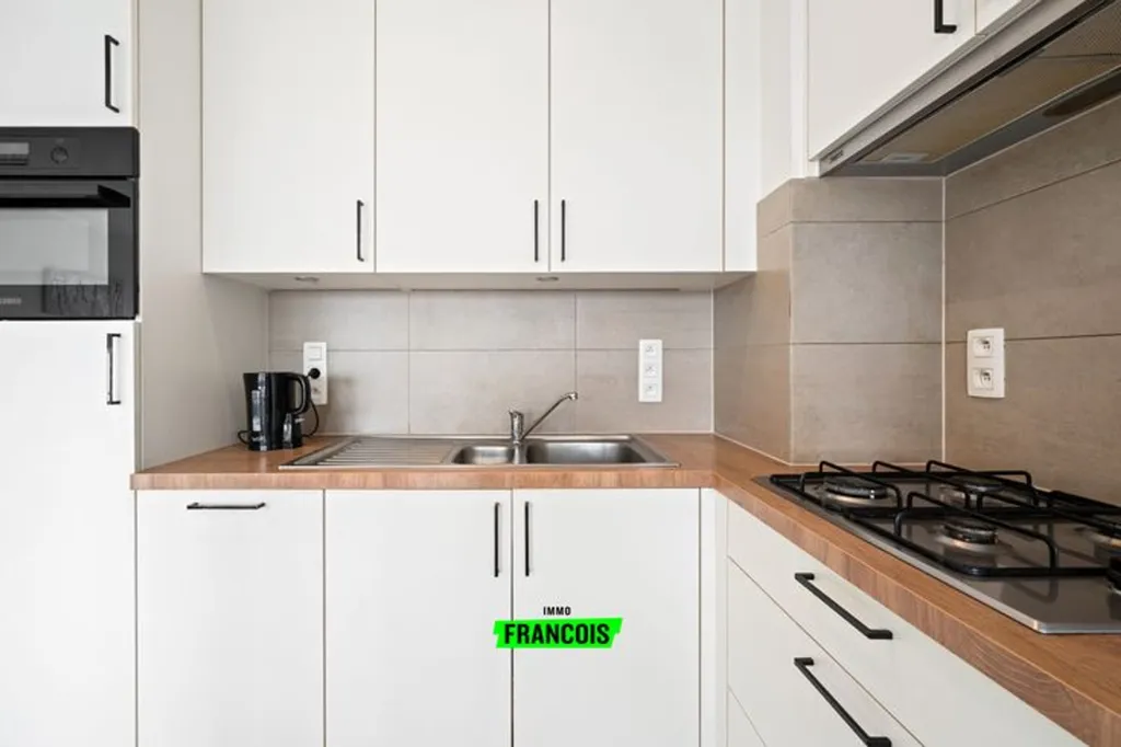 Cuisine - Appartement rénové avec vue sur la promenade à Blanke