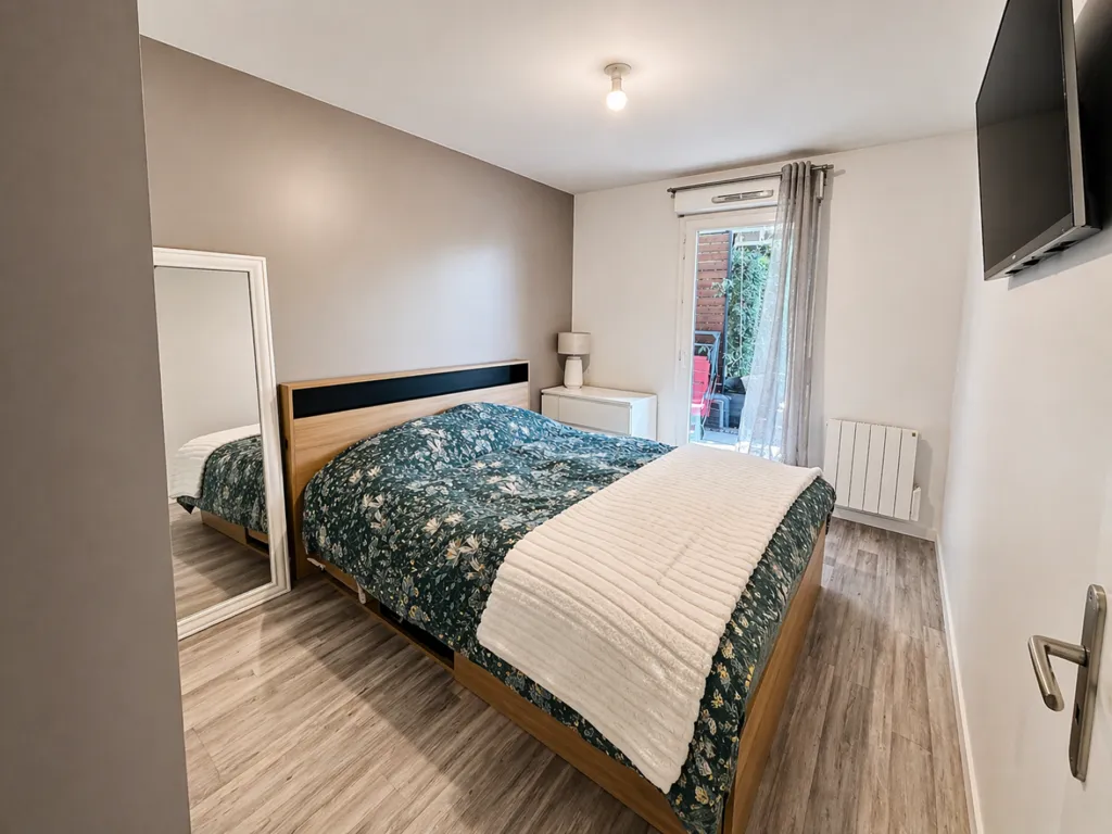 Chambres - Appartement F3 avec Jardin à Sathonay-Village