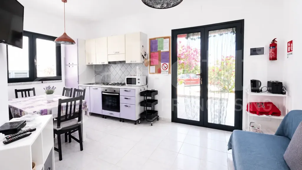 Séjour - Ground Floor Apartment with Veranda in Budoni