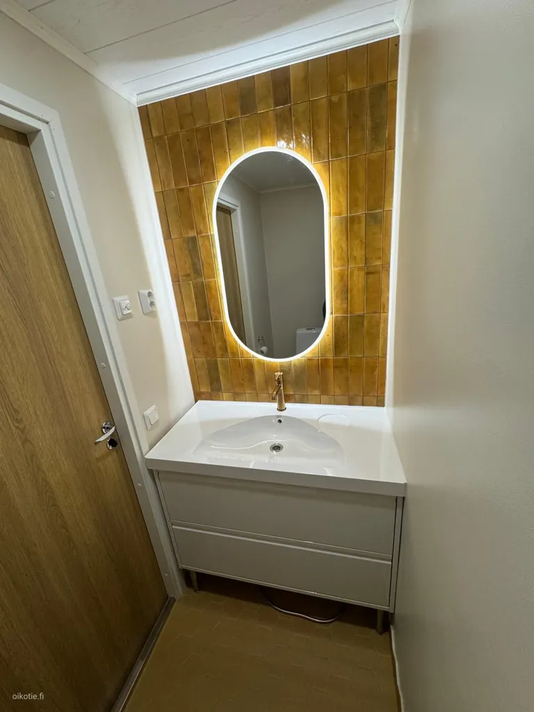 Salles de bain - Modernised Apartment with Garden in Pakila, Helsinki